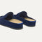 Close up of the heel of The Penny Clog in ReVelvet™ Navy, with Rothy's signature blue halo. 