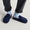 hover | Model wearing The Penny Clog in ReVelvet™ Navy.