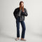 model | An alternate image of a model wearing The Penny Clog in Dove.