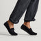 hover | Model wearing The Driver Moc in ReVelvet Black.