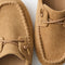 macro | Close up of the toe and vamp of The Driver Moc in ReVelvet Pecan, showing the cord lace details.