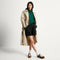 Alternate view of a model wearing The Ivy Sneaker in ReVelvet Cinnamon. 