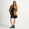 Alternate view of a model wearing The Ivy Sneaker in ReVelvet Evergreen. 