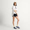 Alternate view of a model wearing The Ivy Sneaker in ReVelvet Overcast. 