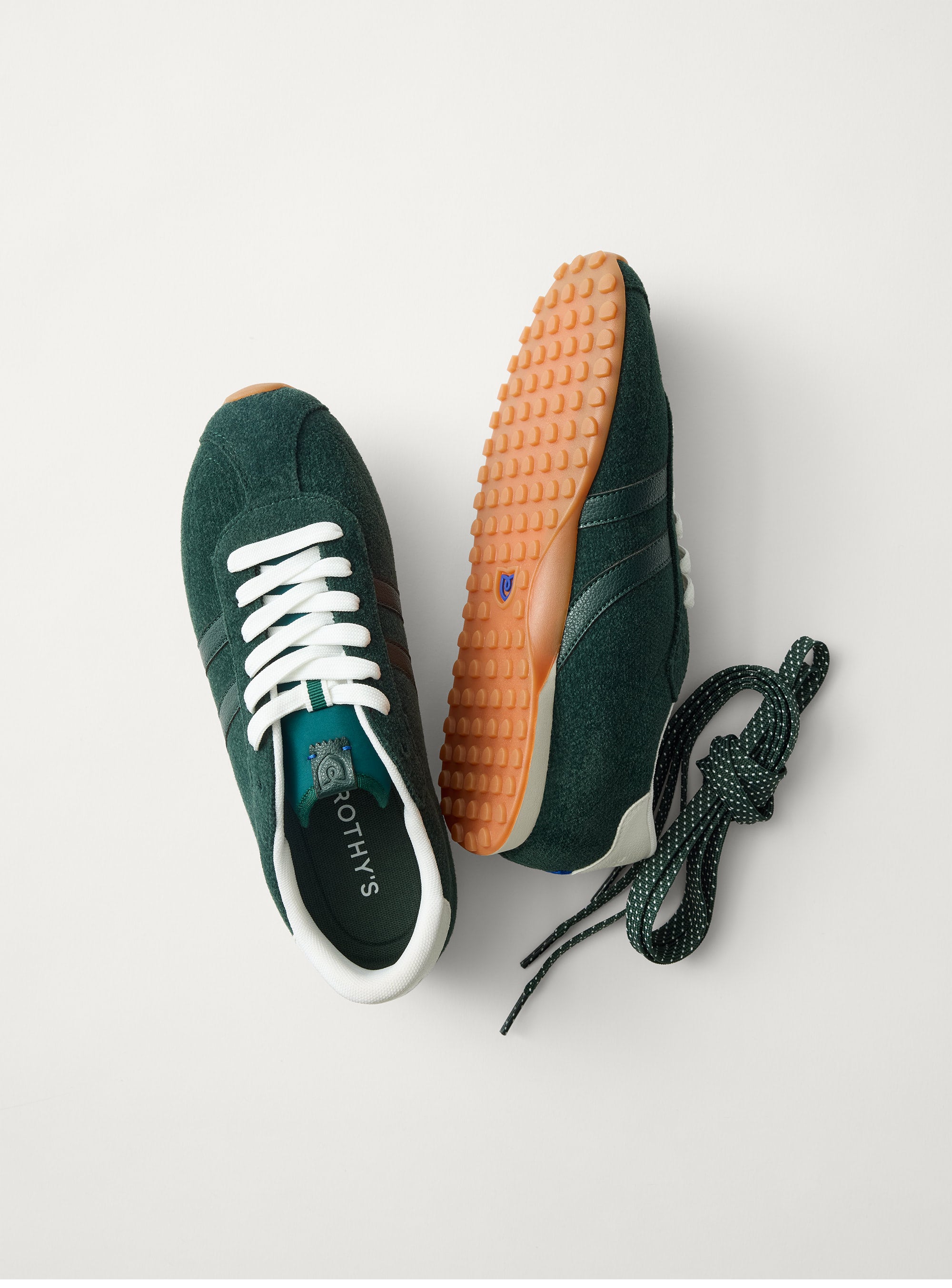 Close up shot The Ivy Sneaker in ReVelvet Evergreen. 