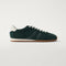 The Ivy Sneaker in ReVelvet Evergreen shown from the side. 