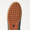 Close up of the durable rubber outsoles of The Ivy Sneaker in ReVelvet Evergreen.