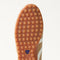 Close up of the durable rubber outsoles of The Ivy Sneaker in ReVelvet Wren.