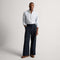 Alternate view of a model wearing The Men's Cruiser Loafer in ReVelvet™ Umber. 