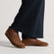 hover | Model wearing The Men's Cruiser Loafer in ReVelvet™ Umber.