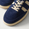 Close up of the toe and stitching details of The Men's Court Sneaker in ReVelvet™ Deep Navy.