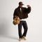 model | Alternate view of a model wearing The Men's Court Sneaker in ReVelvet™ Pecan.