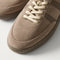 Close up of the toe and stitching details of The Men's Court Sneaker in ReVelvet™ Sparrow.