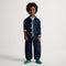 Alternate view of a model wearing The Mini Loafer in ReVelvet™ Peapod. 