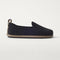 The Mini Loafer in ReVelvet™ Black shown from a side view showing the outsole.