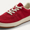 hover | Overlay::Stretchy, No-Tie Laces | Alt:: Close up of the vamp and laces of The Kids Stretch Sneaker in Firecracker.
