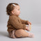 hover | Model wearing The Baby Moc in Blush Teddy.