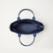 The Lightweight Zip Tote in ReVelvet Deep Navy, shown from above with the interior exposed.