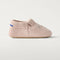 side | The Baby Moc in Blush Teddy shown from the side.