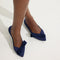 hover | Model wearing The Bow Point II in Deep Navy. 