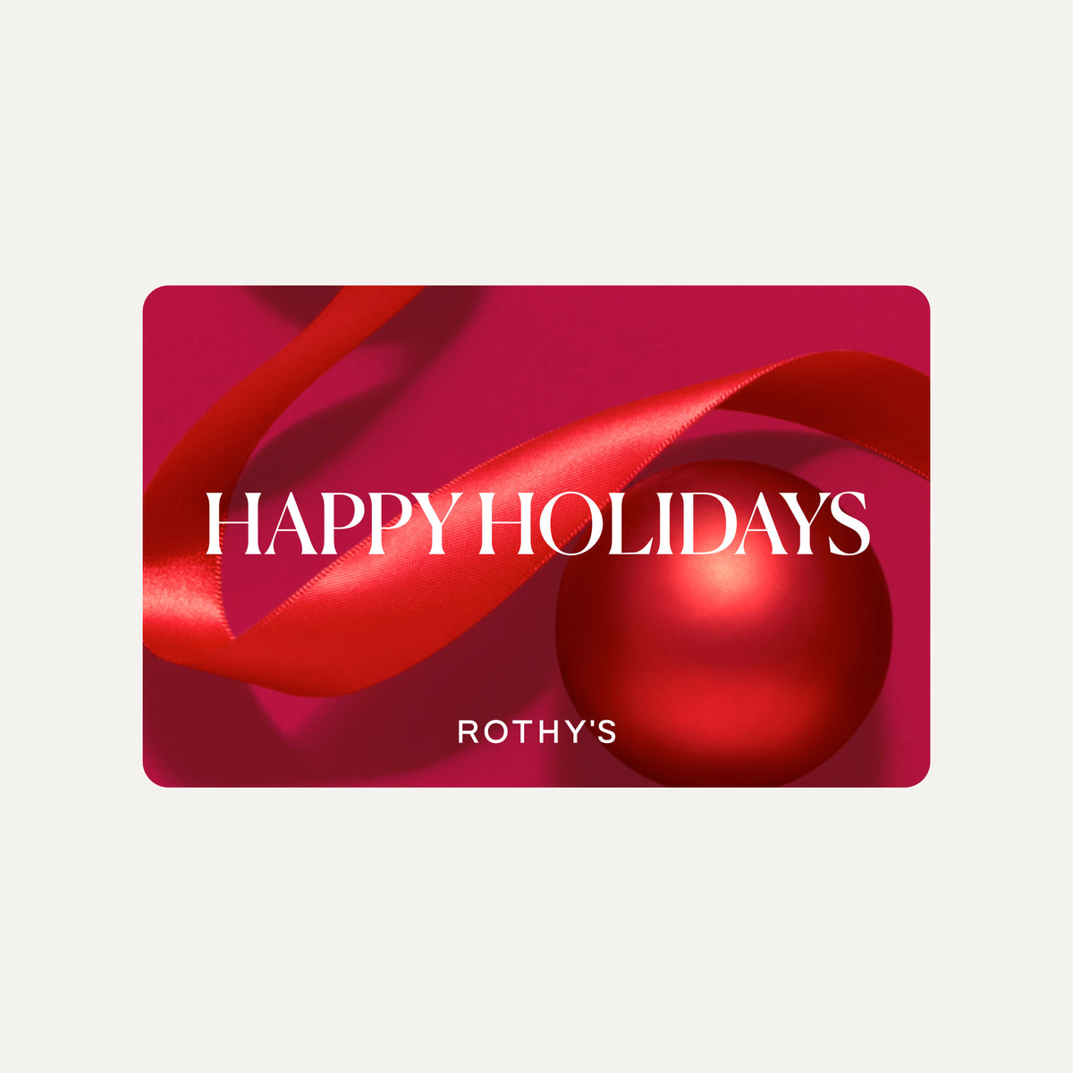 A festive holiday gift card from Rothy's featuring a deep magenta background, a glossy red ornament, and a flowing red ribbon with the text 'HAPPY HOLIDAYS' and 'ROTHY'S' in white.
