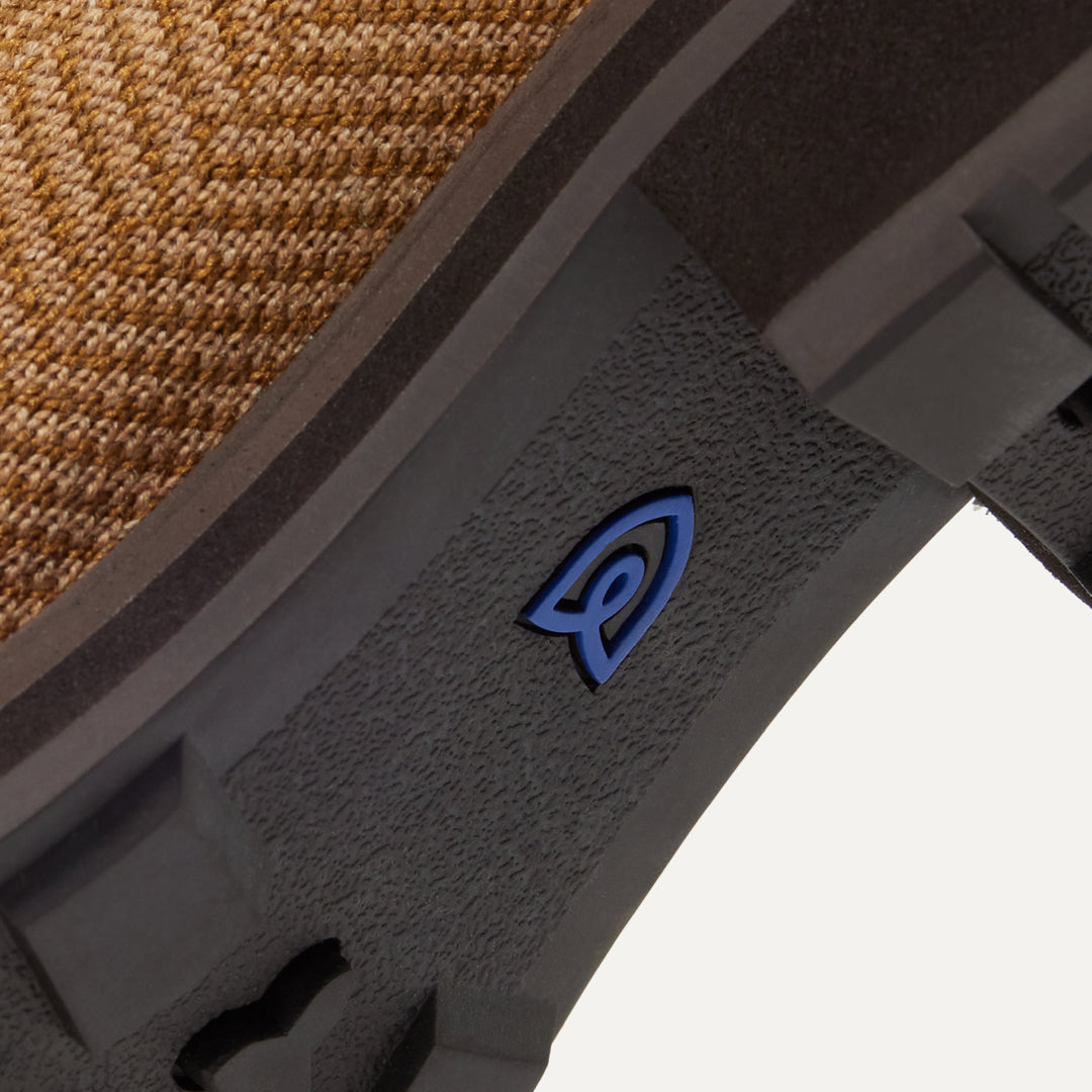 A close up view of the heel of The Lug Loafer, with raised grooves for added traction.