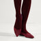 hover | Model wearing The Point II in Garnet Chantilly. 