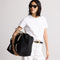 Alternative of model holding The Travel Duffle Bag in Ink.