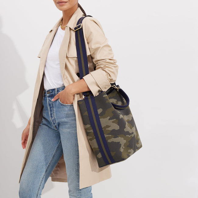 The Bucket Bag in Spruce Camo shown on model. 
