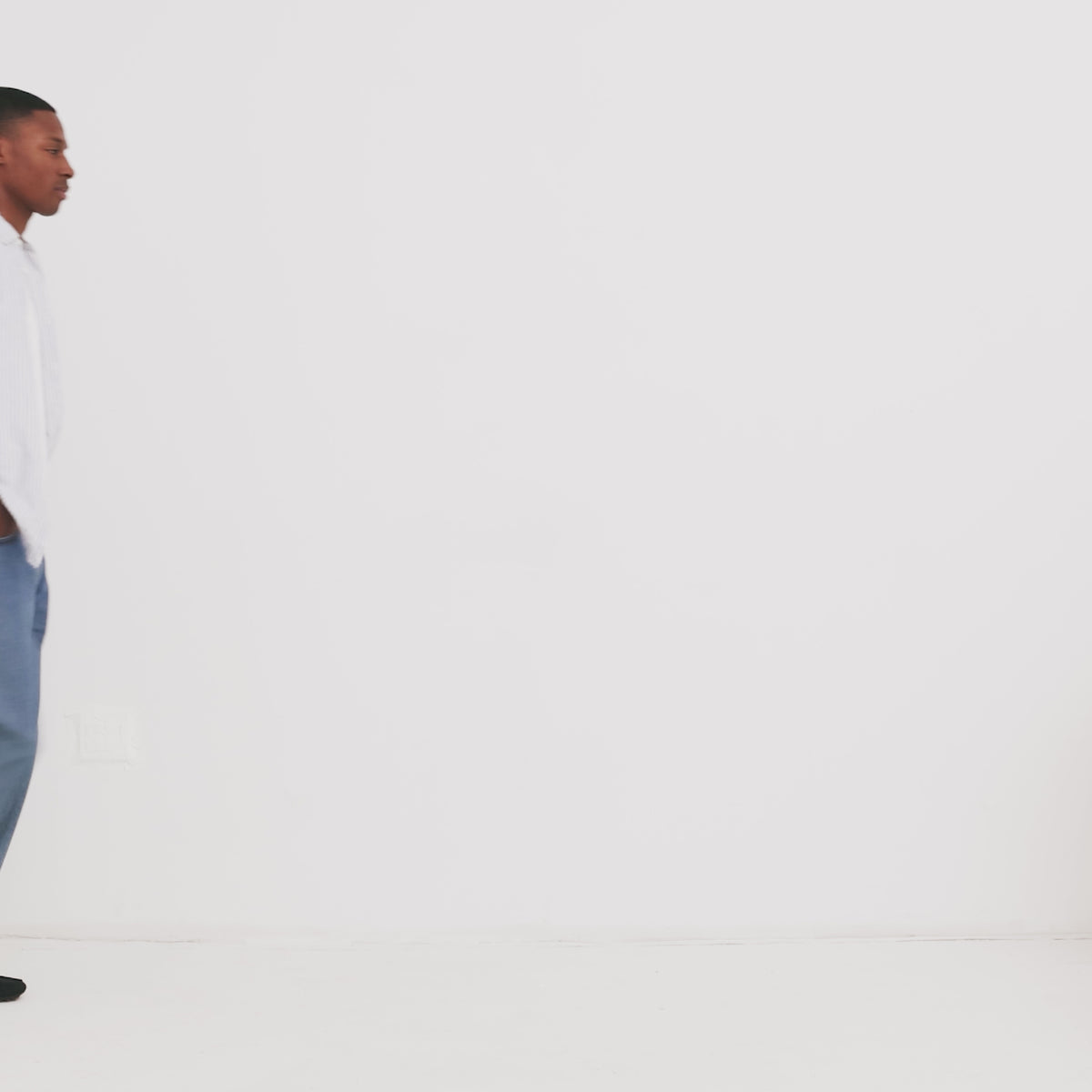 Model walking in The Men's Driver showing different angles of the shoes.