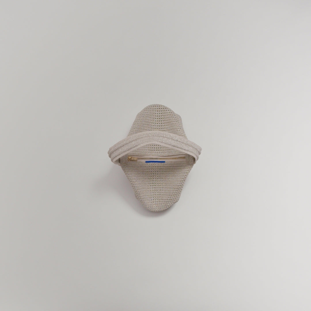 A video of The Party Pouch in Diamond Sparkle being packed with small items and zipped.