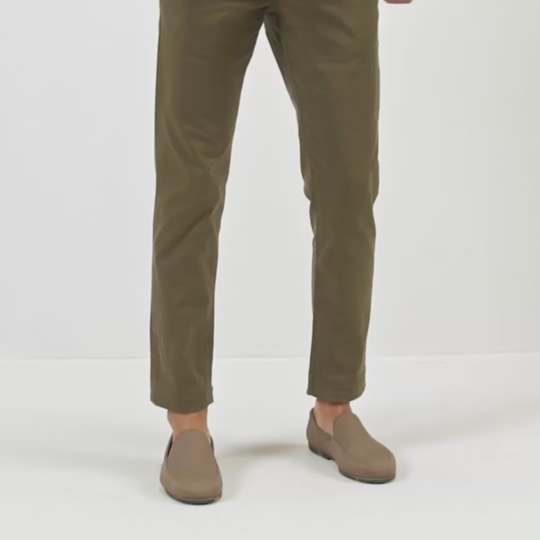 Model walking in The Ravello Loafer in Faded Brown and showing different angles of the shoes.