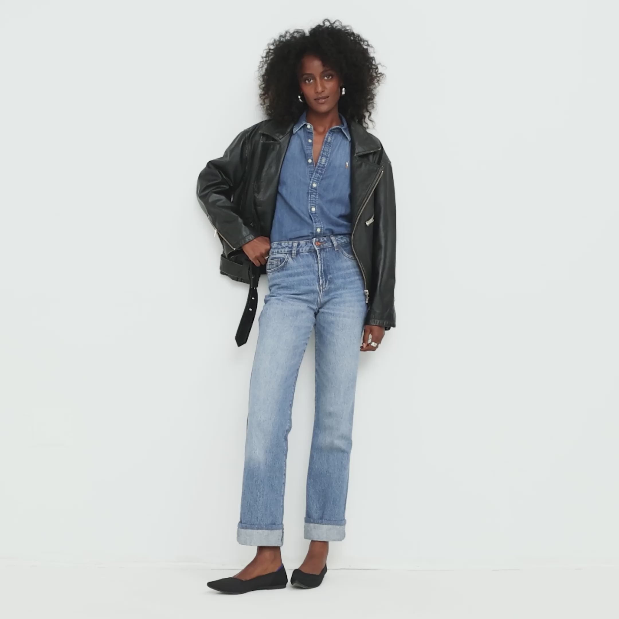 Model walking in The Point II in Black  and showing different angles of the flat. 
