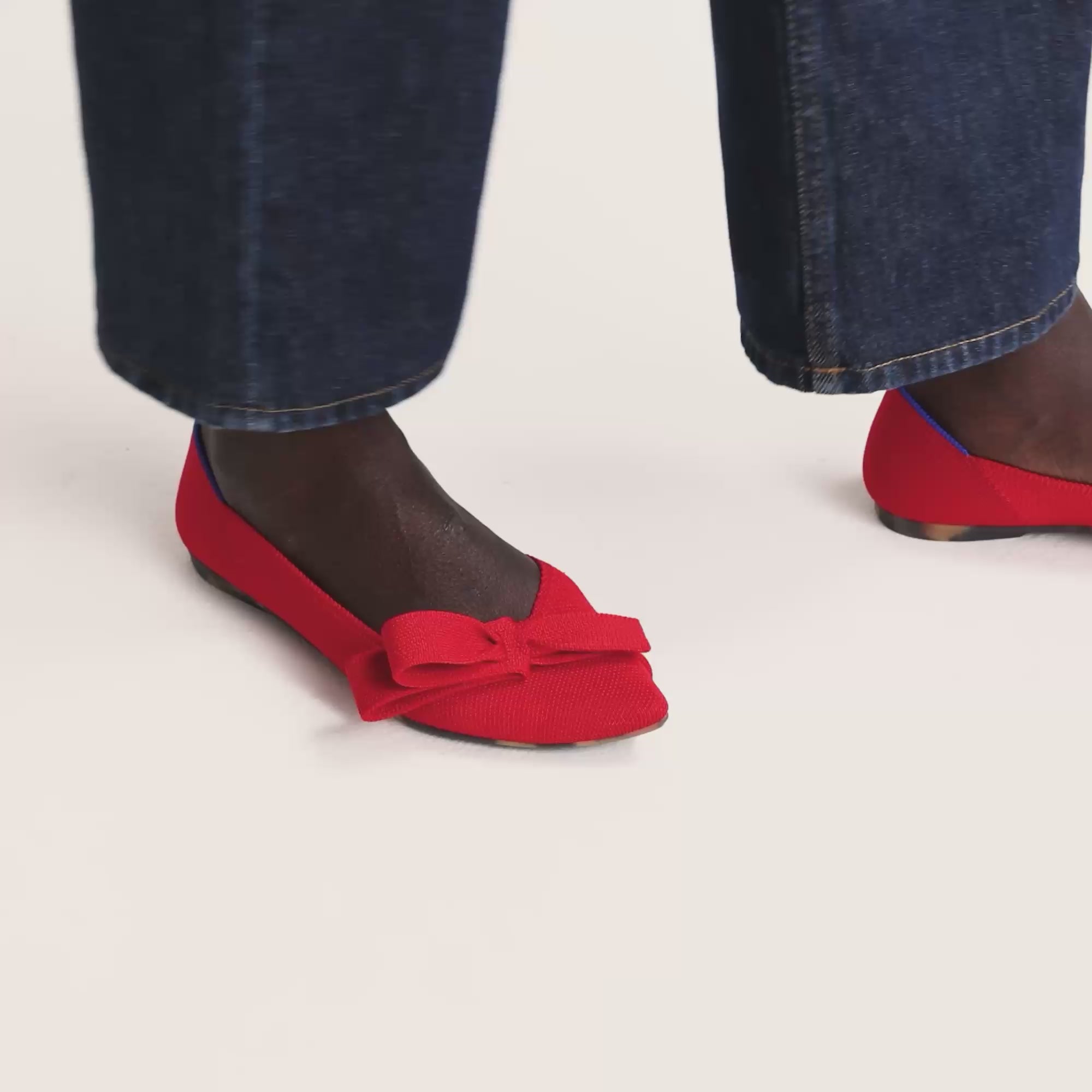 Model walking in The Bow Point II II in Cupid and showing different angles of the shoes. 