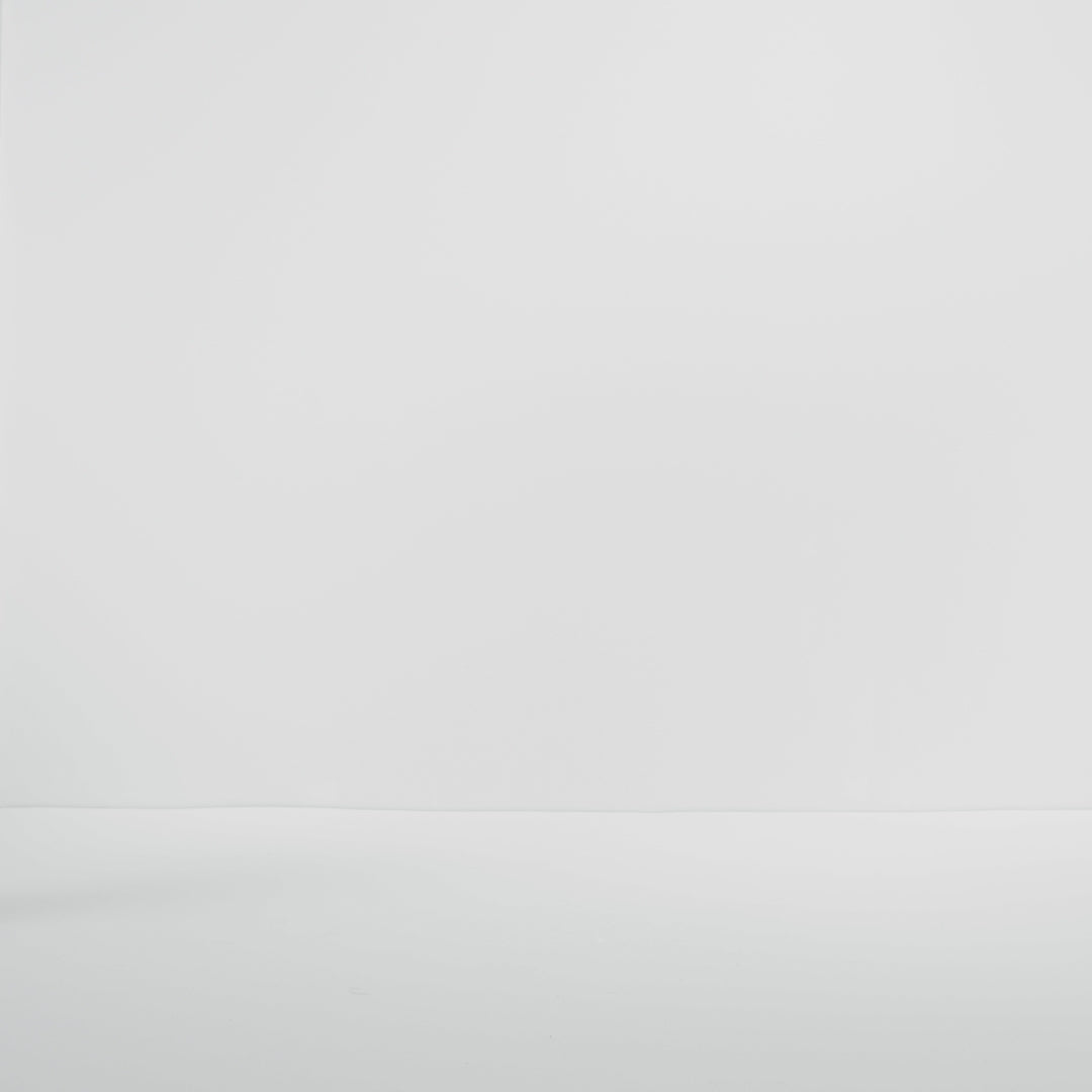 Model walking in The Lounge Loafer in Black and showing different angles of the shoe. 