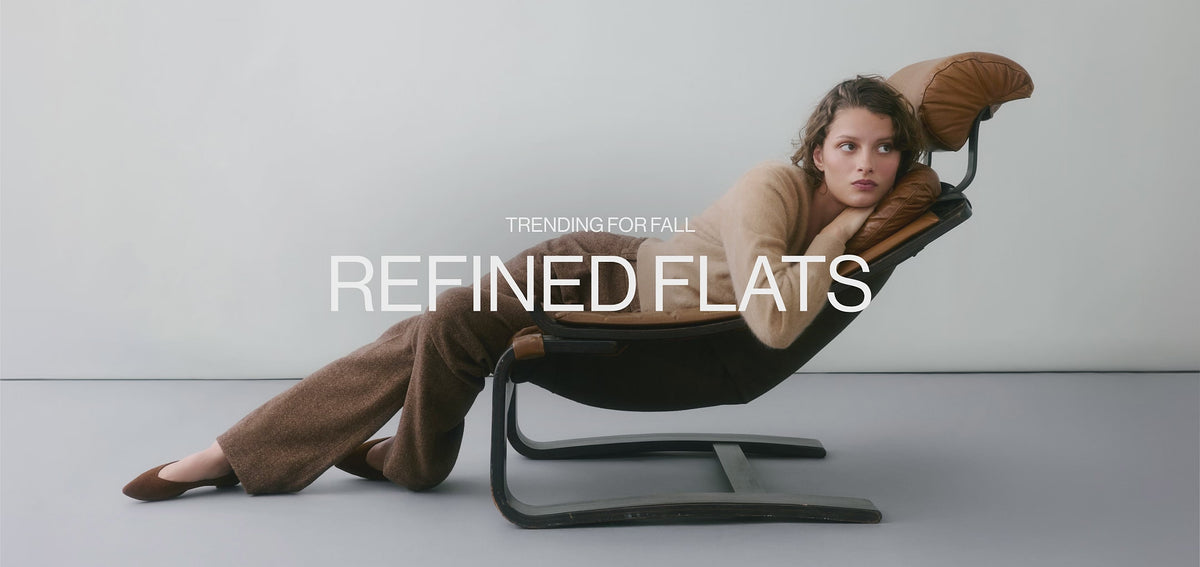 Model wearing The Point III with text overlay, "Trending For Fall Refined Flats."