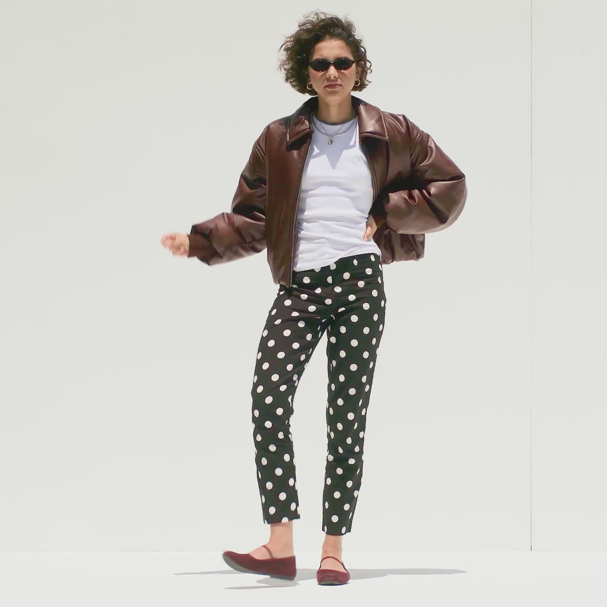 Model moving around in The Max Square Mary Jane in ReVelvet Syrah, showing different angles of the shoe. 
