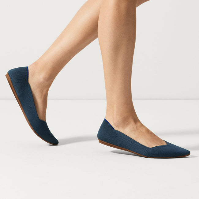 hover | Model wearing The Point in Navy.