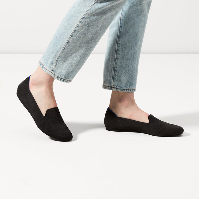 hover | The Loafer in Black Solid shown on-model at an angle.