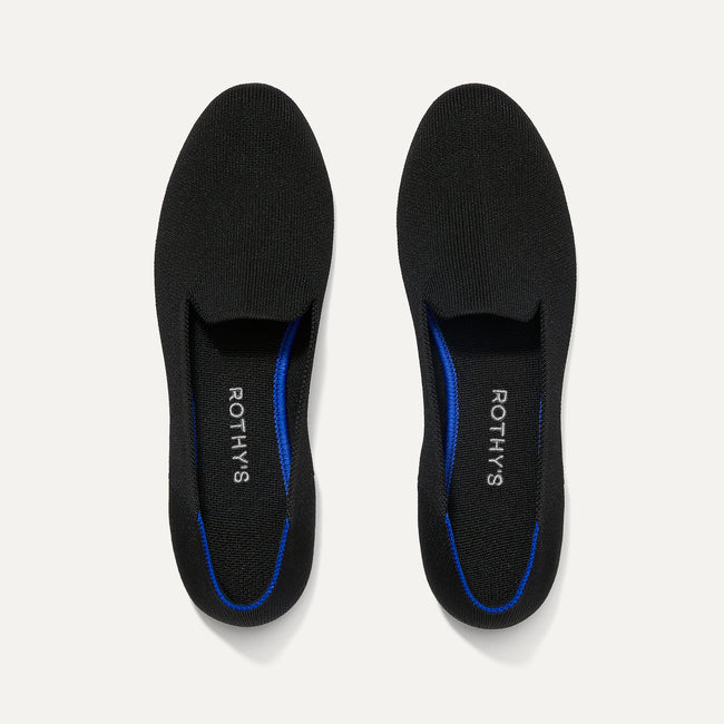 A pair of The Loafers in Black Solid shown from the top view.