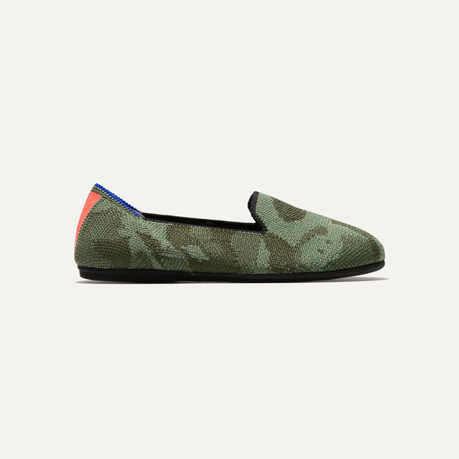 The Kids slip-on Loafer in Olive Camo shown from a side view showing the outsole.