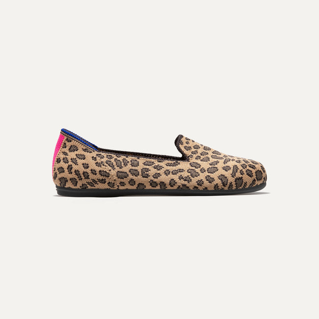 The Kids slip-on Loafer in Spotted shown from a side view showing the outsole.