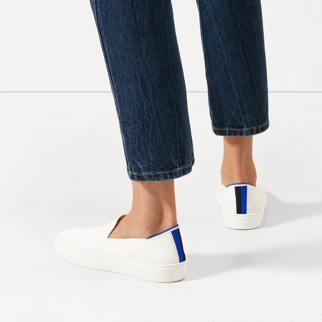 The slip-on Sneaker in Bright White shown on-model at an angle.