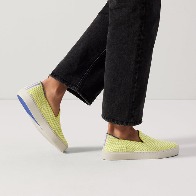 hover | Model wearing The Original Slip On Sneaker in Electric Check. 
