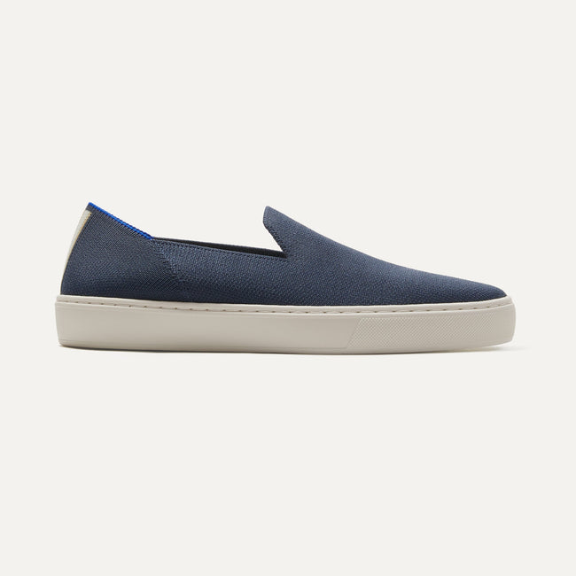 The Sneaker in Navy shown from the side. 
