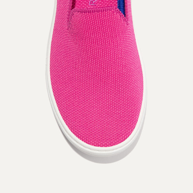 The Kids slip-on Sneaker in Bubblegum shown from the top view with detailing of the front of the shoe.