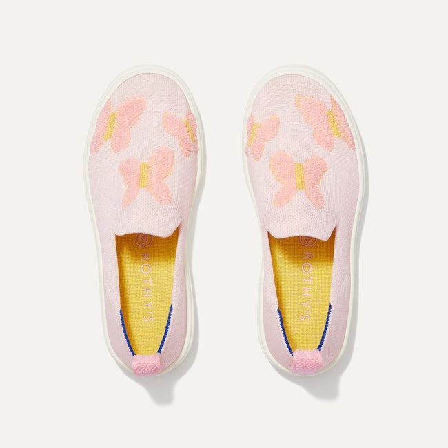 A pair of The Kids slip-on Sneakers in Flutter Pink shown from the top view.