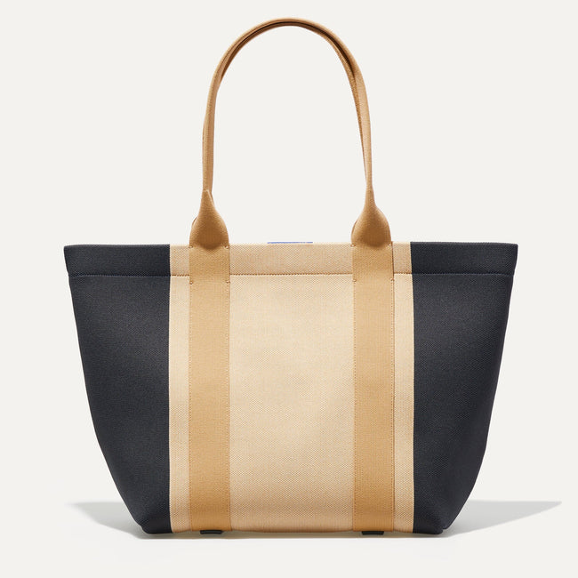 The Essential Tote in Ink and Ivory shown from the front.