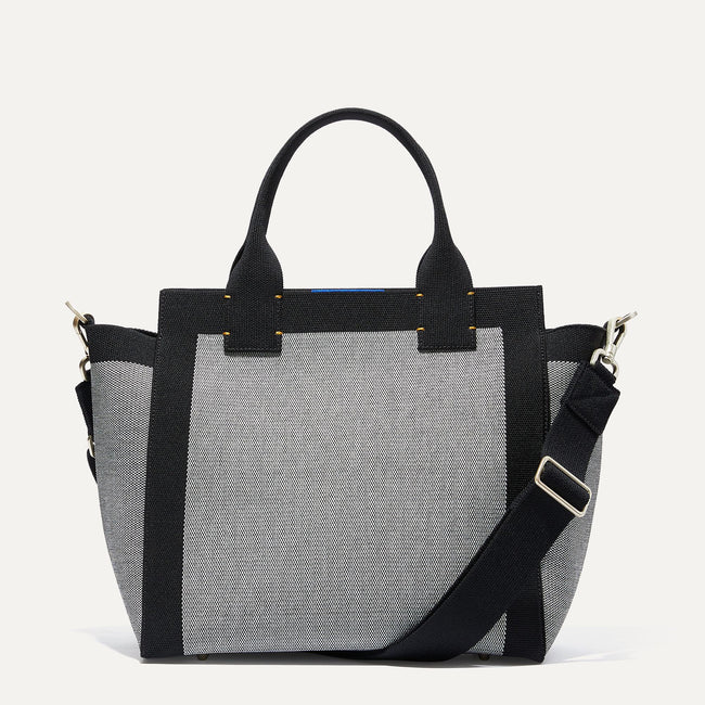 The Handbag in Grey Mist shown from the front.