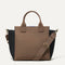 PDP |The Handbag in Black Cocoa shown from the front.